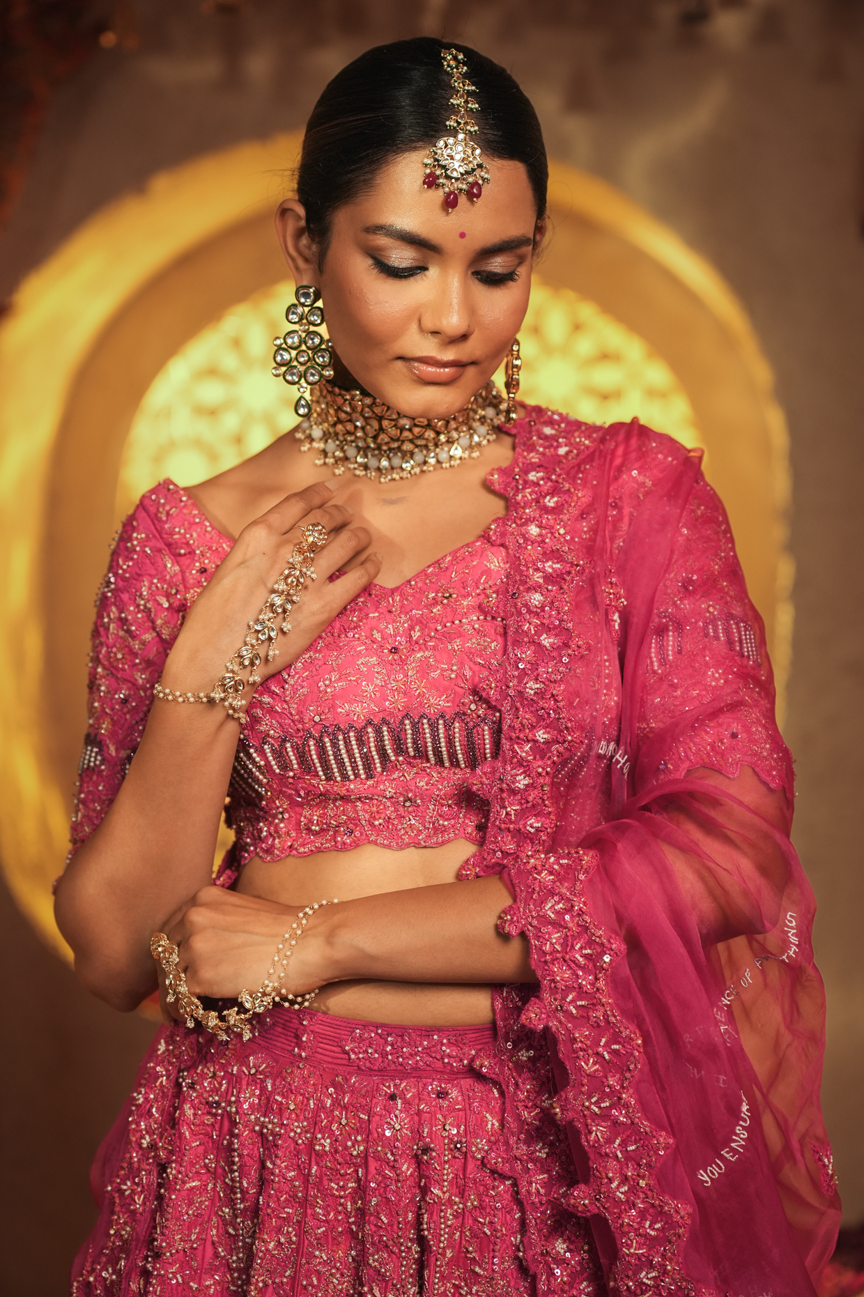 Ember Rose A striking Fuchsia Bridal Lehenga Set
